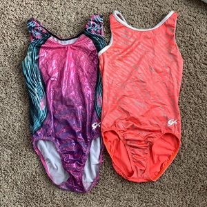 GK Elite gymnastics leotards sold together.